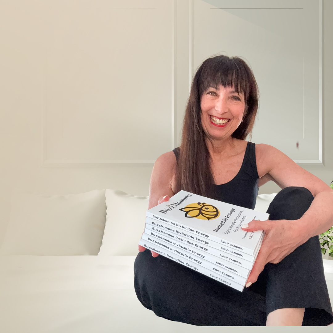 Emily with her BuzzMomma book